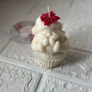 Santa in a cupcake candle