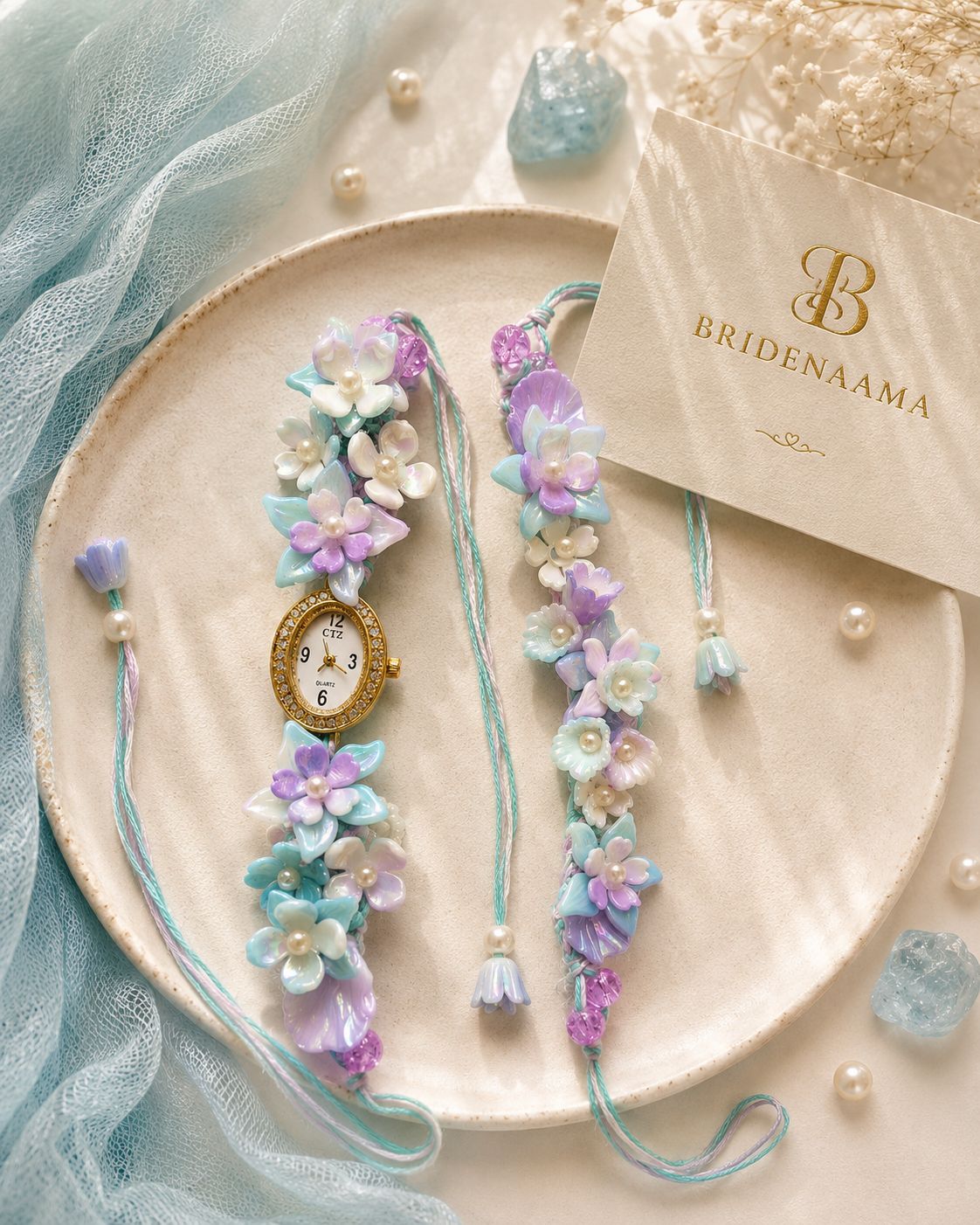 1. Floral Diva - watch style lumbi plus rakhi -BLUE tones