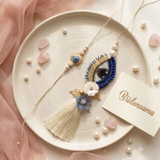 Evil eye protector - broach style pair of rakhi and lumbi