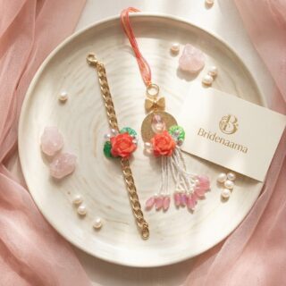 Divine Lotus synergy pair of rakhi and lumbi