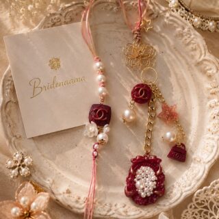 Chanel pair of rakhi and lumbi