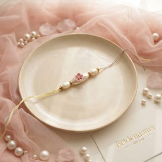 Cremica - ceramic rose rakhi
