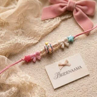 Bow bliss rakhi for little girl on leather cord